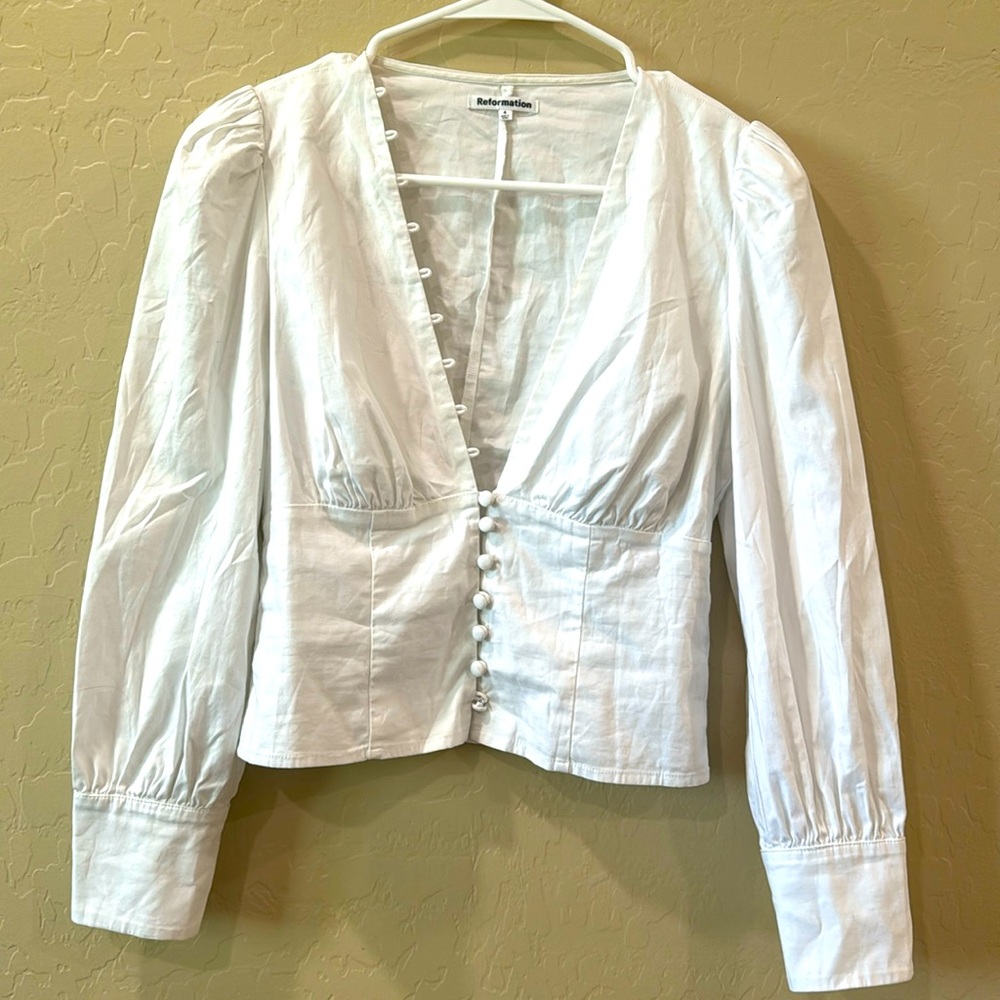 Reformation White Blouse in Size 4.